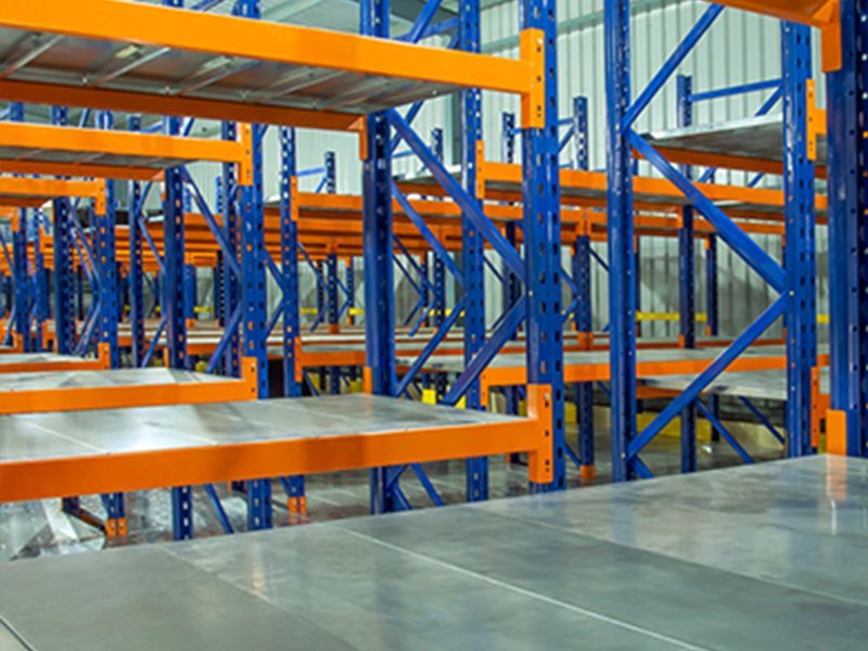 Heavy duty pallet racking loaded with palletised stock