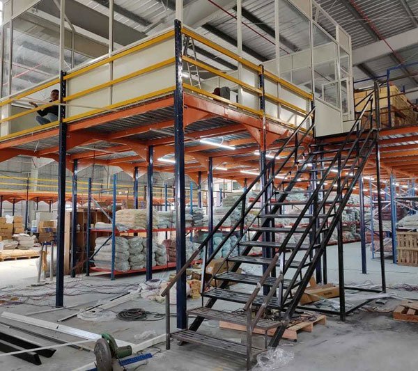 Steel mezzanine floor supported on columns adding a second storage level