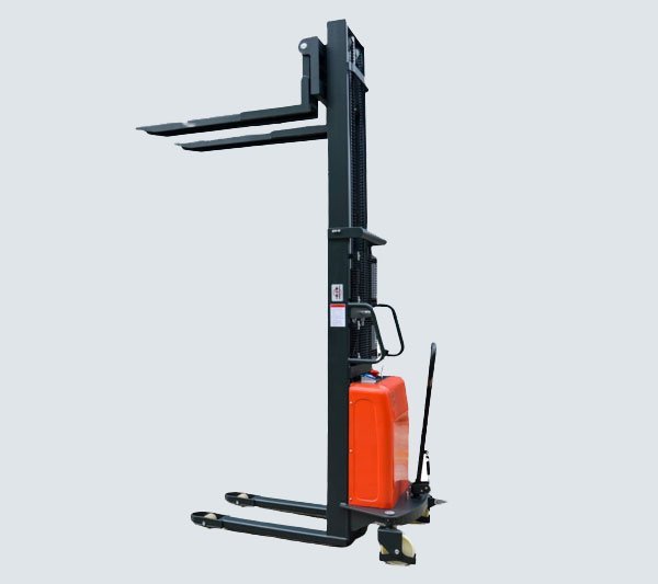 Semi electric stacker with powered mast lifting a pallet onto racking
