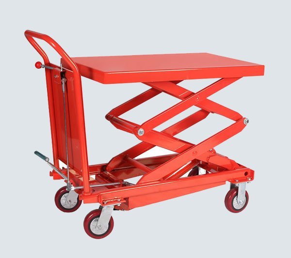 Mobile portable scissor lift table with the platform partially raised